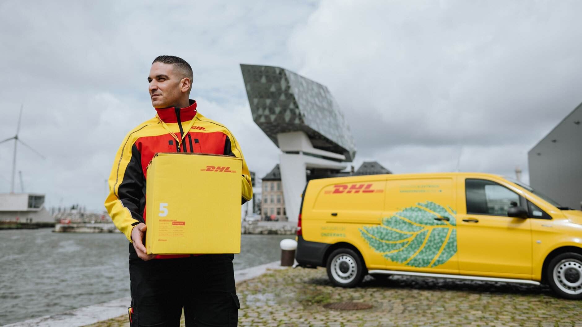 DHL courier with electric van in Antwerp