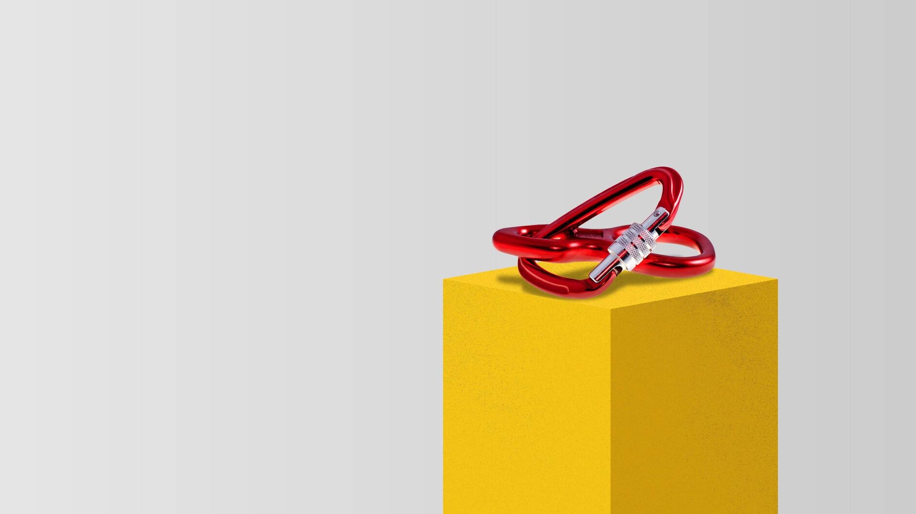 carabiner on yellow pillar