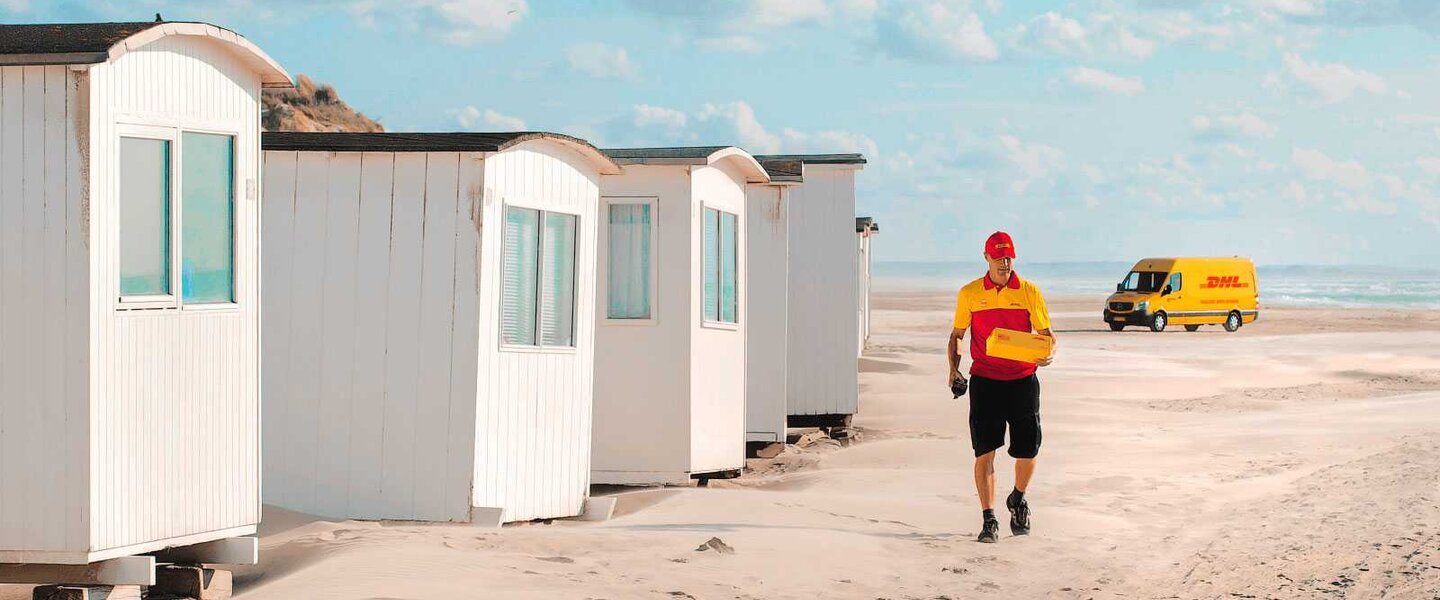 DHL courier at the beach
