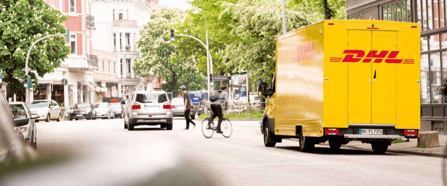 DHL truck in street in Germany
